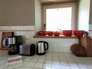 Maisons de vacances Le Moulin borde par l-Aven : photos des chambres