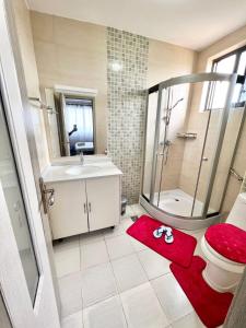 Elegant luxurious three bedroom with swimming pool well equipped gym ample parking space and children playing ground and a relaxing rooftop with and amazing scenic city views