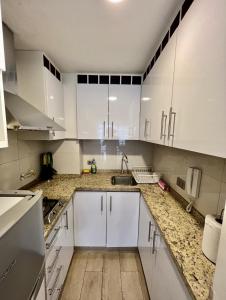 Apartamento 2 habitaciones Las Condes I Mall Parque Arauco I Estacionamiento I Calefacción