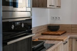 Appartements Aux pieds des pistes - Appt B : photos des chambres