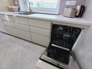 Dom 200m od pláže s terasou na grilování priamo na Slnečných jazerach Senec