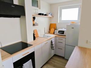 LE SUNSET - Face Mer