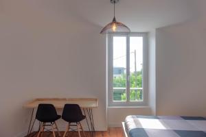 Appartements Les suites de Jeanne : photos des chambres