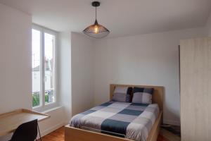 Appartements Les suites de Jeanne : photos des chambres