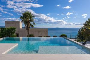 Seaview Villa ABA with 38sqm heated infinity pool, 4 bedrooms, Media room, 150m from sea