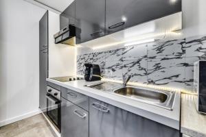Appartements IDEAL Pro & Familles, Billard, Borne Arcade, Netflix et Disney Plus, Jeu Bonus OFFERT : photos des chambres