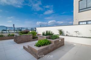 Estadia completa com piscina a 400m da Praia da Armação - SKL