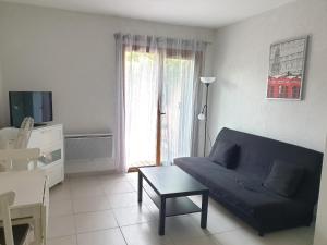 Appartements Studio avec jardin proche de la Mer : photos des chambres