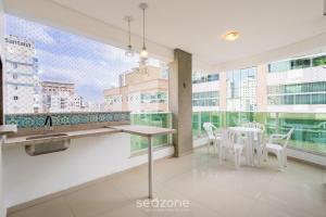 Apto 450m da praia c churrasq. e 3 suítes TAH0602