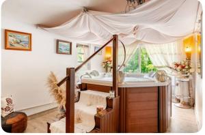 Gîte Loft Non attenant à la propriété 4 hotes Sauna et Jacuzzi en option