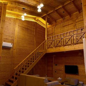 أكواخ القرية -VILLAGE HUTs