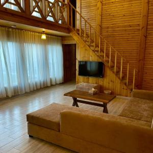 أكواخ القرية -VILLAGE HUTs