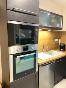 Superbe T2 climatisé avec patio et jardin