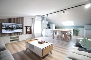 Appartements Verdun Centre - Full climatisation - 3 chambres - 7 couchages - 10 personnes - Parking Proche - Terrain 800m2 - Balneotherapie - Air de jeux exterieurs - TOP CONFORT - Gere par PrestaZen-Services : photos des chambres