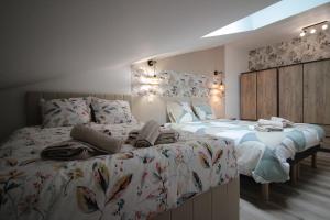 Appartements Verdun Centre - Full climatisation - 3 chambres - 7 couchages - 10 personnes - Parking Proche - Terrain 800m2 - Balneotherapie - Air de jeux exterieurs - TOP CONFORT - Gere par PrestaZen-Services : photos des chambres