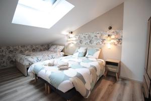 Appartements Verdun Centre - Full climatisation - 3 chambres - 7 couchages - 10 personnes - Parking Proche - Terrain 800m2 - Balneotherapie - Air de jeux exterieurs - TOP CONFORT - Gere par PrestaZen-Services : photos des chambres