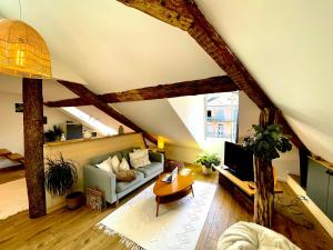 Appartements Nid douillet sous les toits avec jacuzzi : photos des chambres