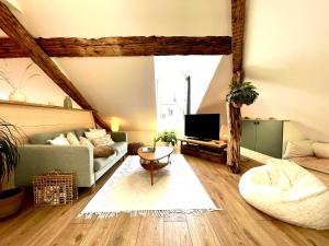 Appartements Nid douillet sous les toits avec jacuzzi : photos des chambres