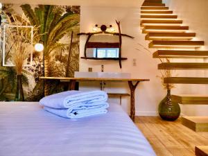 Appartements Nid douillet sous les toits avec jacuzzi : photos des chambres