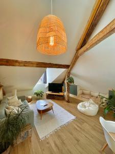 Appartements Nid douillet sous les toits avec jacuzzi : photos des chambres