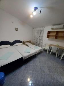 Maca apartmani