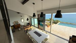 Villas Vue sur mer EPOUSTOUFLANTE : photos des chambres