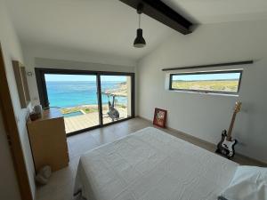 Villas Vue sur mer EPOUSTOUFLANTE : photos des chambres