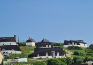 Campings Mobil-home Vue mer Piscine - Camping La Falaise Equihen-Plage - La Coquille d-Opale : photos des chambres