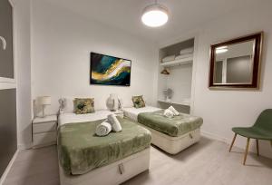 Postiguet Beach by United Renters