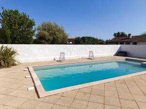 Maisons de vacances Villa du lagon avec piscine : photos des chambres