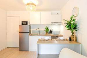 Appartements Le Carre CDG Studio Elegant : photos des chambres