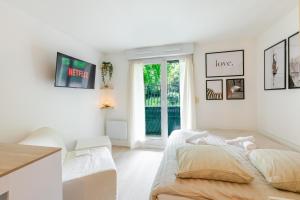 Appartements Le Carre CDG Studio Elegant : photos des chambres