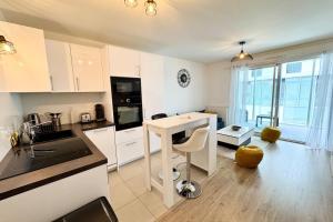 Péristyle - T2 de standing neuf - Balcon