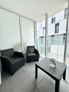Appartements Peristyle - T2 de standing neuf - Balcon : photos des chambres
