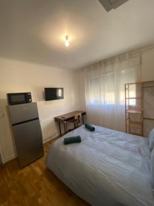 Appartements Studio F1 circuit 24H : photos des chambres