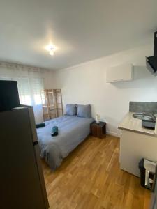 Appartements Studio F1 circuit 24H : photos des chambres