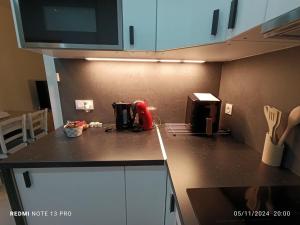 Appartements Jolie petite maison a Paris : photos des chambres