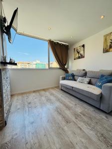 Cosy T2 climatisé sur le port à 5min de la mer parking privé linge de bain et de lit fournis