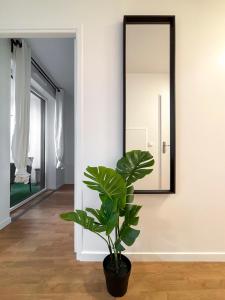 Appartements Appartement Cosy avec Loggia et Parking prive : photos des chambres