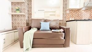 Strategic and Cozy 2BR Bassura City Apartment By Travelio