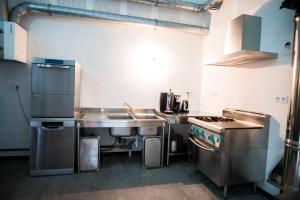 Maisons de vacances L-Atelier Dollonnais Gite spacieux en Sarthe avec studios, piscine chauffee et home cinema : photos des chambres