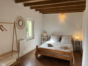 Maisons de vacances La petite maison dans le village : photos des chambres