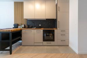 Ceglana Modena Park Apartment by BookingHost