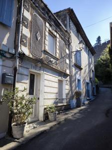 Maisons de vacances Maison des Remparts nichee sous la Cite : photos des chambres