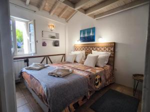 Maisons de vacances Maison des Remparts nichee sous la Cite : photos des chambres