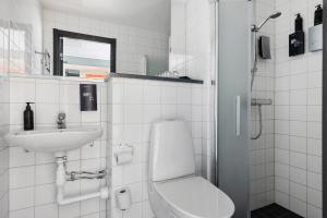 Family Studio with One King Bed and Two Single Beds - Non-Smoking room in First Hotel Central