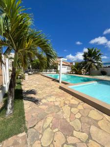 Casa pé na areia em condomínio