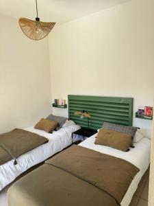 Appartements bel appartement avec jardin : photos des chambres