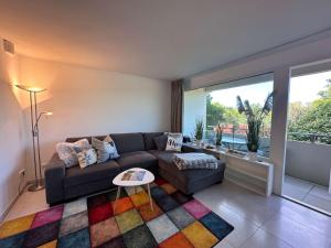 Sky & Sand Homes Springtide I Helle Wohnung mit Balkon und Tennisplatz