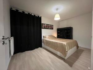 Appartements T2 moderne avec terrasse, proche de Lyon : photos des chambres